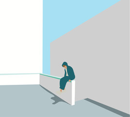 Attractive young man in green hoody coat who lost job abandoned and lost in depression sitting on white wall, looking away suffering emotional pain, crying alone.