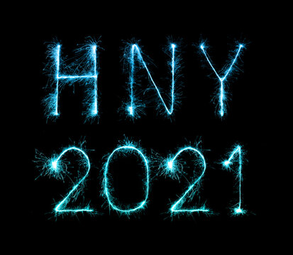 2021 happy new year fireworks written sparklers at night