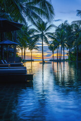 Obraz na płótnie Canvas pool and poolside bangalow at seaside resort and hotel