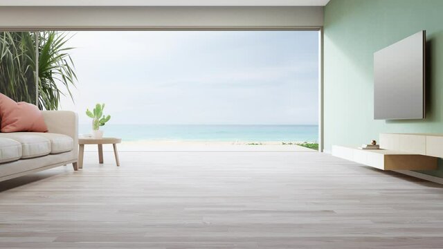 Coffee table on wooden floor of large living room and sofa near TV in modern beach house or luxury villa. Home interior 3d rendering with sea view.