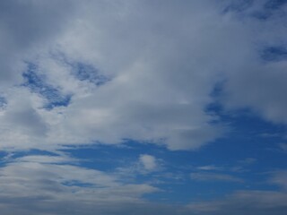 Naklejka na ściany i meble Blue sky with fluffy cloud in rainy season. Beautiful sky in vacation concept. 