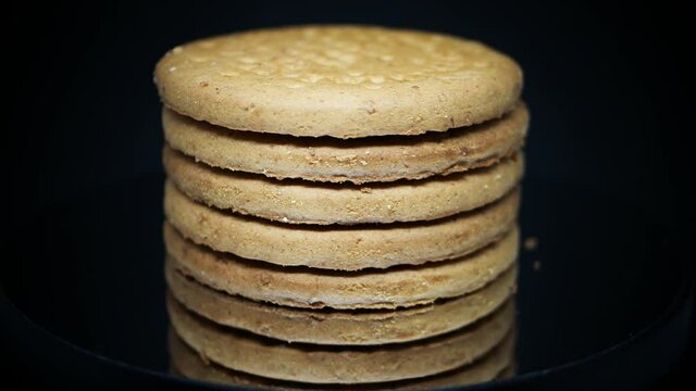 Healthy fiber digestive biscuits rotating closeup 