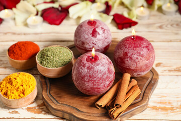 Burning candles with spices for celebration of Divaly on table
