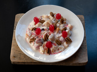 Apple salad on a wooden board