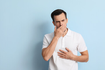 Allergic man on color background