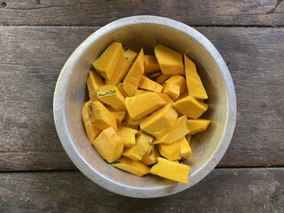 close up yellow pumpkin on table