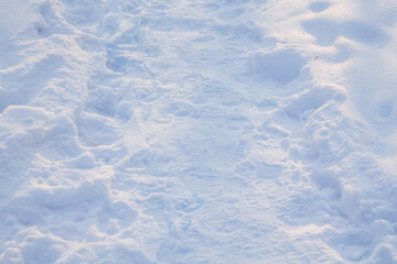 Snow is white on the road. Snow texture. copy space, top view, flat lay, background with blank space for text