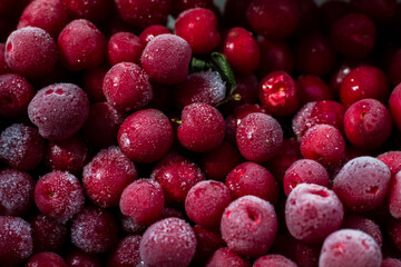 Frozen cherry pattern. ripe red cherry frozen for the winter. Winter blanks. Beautiful berry background. copy space, top view, flat lay