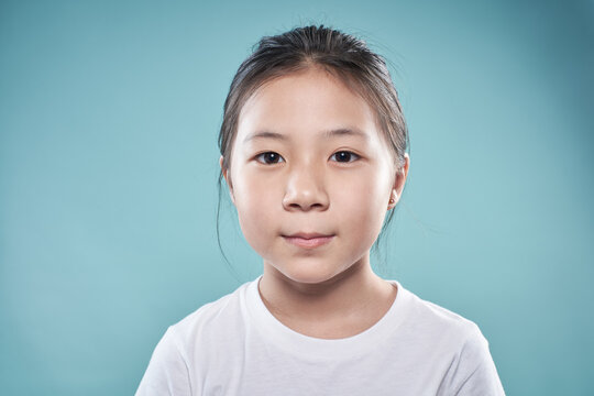 Cute Asian Little Girl With Happy Expression