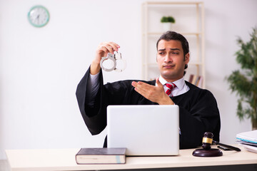 Young male lawyer working in the courthouse