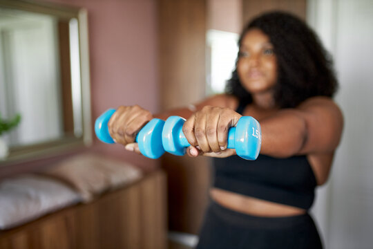 Portrait Of Fat African Woman Exercising With Dumbbells, Lead Healthy Lifestyle, Want To Lose Weight