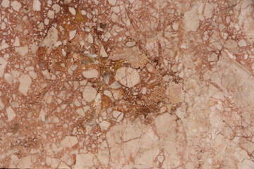 Marble brown stone texture. Light wall background.