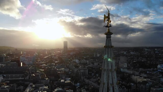 Aerial forward flying towards lightning rod of city hall at Ground Place, Brussels, Belgium