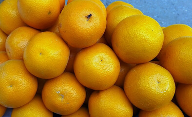 Bunch of Fresh Mandarin Oranges, And Fresh Mandarin Oranges Texture Close Up for Background
