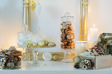Christmas decoration cocoa bar with cookies and sweets in white and gold and vintage style