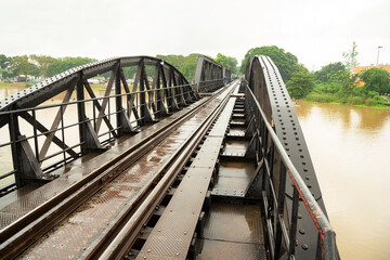 Fototapeta na wymiar The River Kwai Bridge, Death railway bridge is a history of world war ii, Kanchanaburi, Thailand