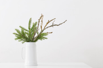 modern Christmas sill life in jug on white background