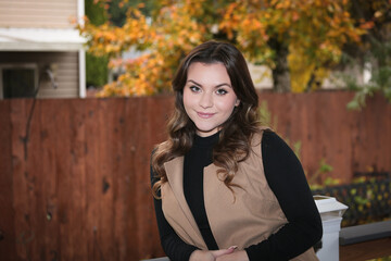 Close up Portrait of 18 Years Old Beautiful, Gorgeous Girl with Long Brown hair and Big eyes, Blurry Fall Background, Happy Teenager 