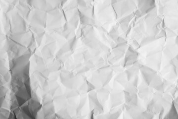 Obraz premium White crumpled paper background texture