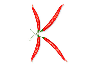 Alphabet letter K made from red hot chili peppers. Letter isolated on white background.