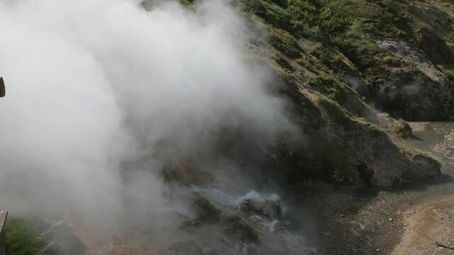 Erupting geyser Bolshoy (Big) in the Valley of Geysers, Kamchatka peninsula, Russia, 4k