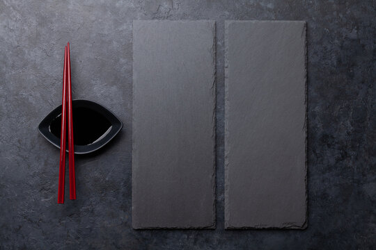 Stone plates and chopsticks for your sushi and maki