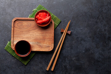 Wooden plate and chopsticks for your sushi and maki