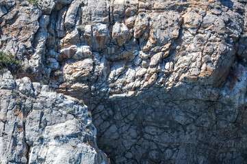 Stone rock in the mountains as an abstract background.