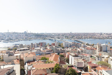 Fototapeta na wymiar Aerial view from Galata Tower on Istanbul, Turkey. Panoramic view on Golden Horn and Galata bridge