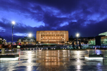 The Parliament building and Citizens square in the rainy evening, Helsinki, Finland.