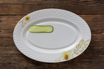 food styling Vegetable salad white dish, top view