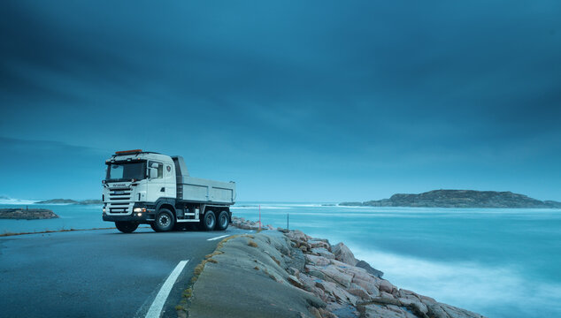 Lindesnes, Norway - december 24 2013: Scania R480 parked by the sea in the evening..