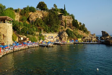 Fototapeta na wymiar View of Mermerli Beach in historical Kaleici district of Antalya, Turkey.