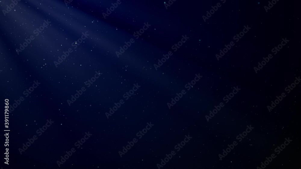 Wall mural beautiful floating dust particles with flare on dark background in slow motion. looped animation of 
