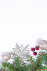 silver snowflake, silver balls and Christmas tree twigs. Christmas decoration with copy space