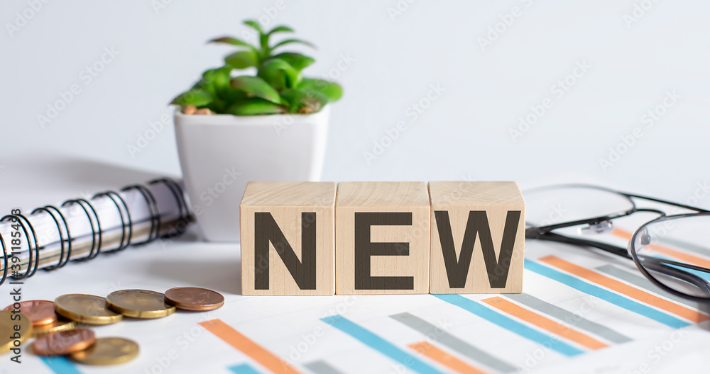 Poster new text on wooden blocks business concept graph background