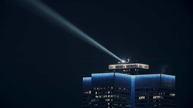 Spinning Lights on top of High Tower Downtown Montreal at Night