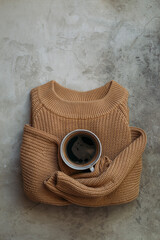 Morning concept composition with coffee. fresh flowers on stone background.  Flat lay with copy...