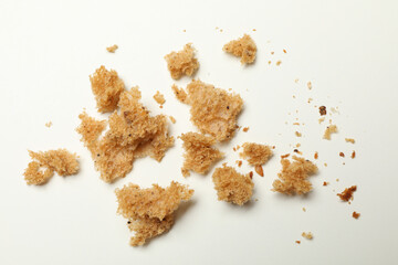 Fresh bread crumbs on white background, close up