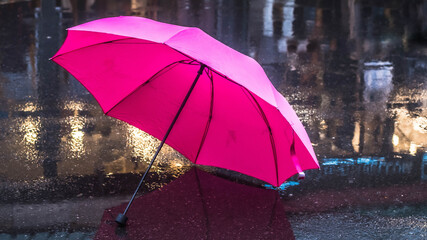 Pink Umbrella after the rain. Pink umbrella on the wet