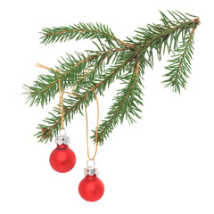 Green fir needle twigs with red decorative christmas balls isolated on white