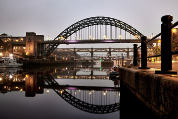 Tyne Bridge on River Tyne - Newcastle Upon Tyne - Night City shot with lights and reflection