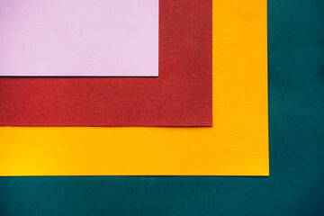 Abstract square background.Dark green, yellow and terracotta.