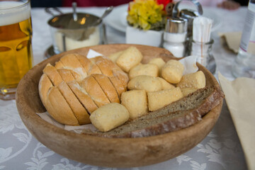 Bread basket, served on the table in a restaurant 