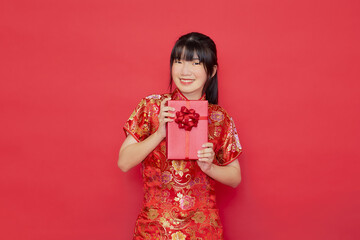 Portrait young Asian woman wear Chinese dress red