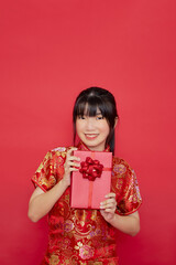 Portrait young Asian woman wear Chinese dress red