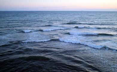 Naklejka na ściany i meble Beautiful big sea waves with foam in the black sea