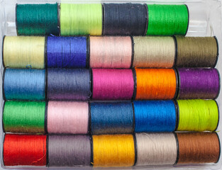 A set of colored threads on the coils
