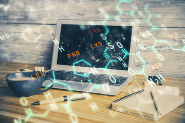 Desktop computer background and formula hologram writing. Double exposure. Education concept.