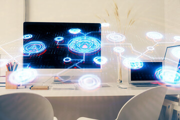 Computer on desktop with social network hologram. Double exposure. Concept of international people connections.